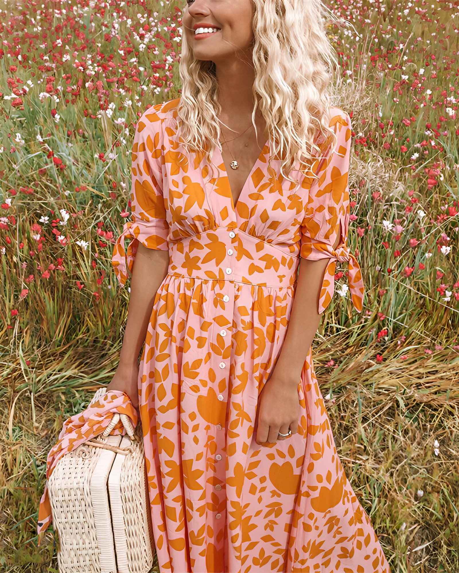 Serena - Elegantes Kleid mit einem leuchtenden orangefarbenen Print